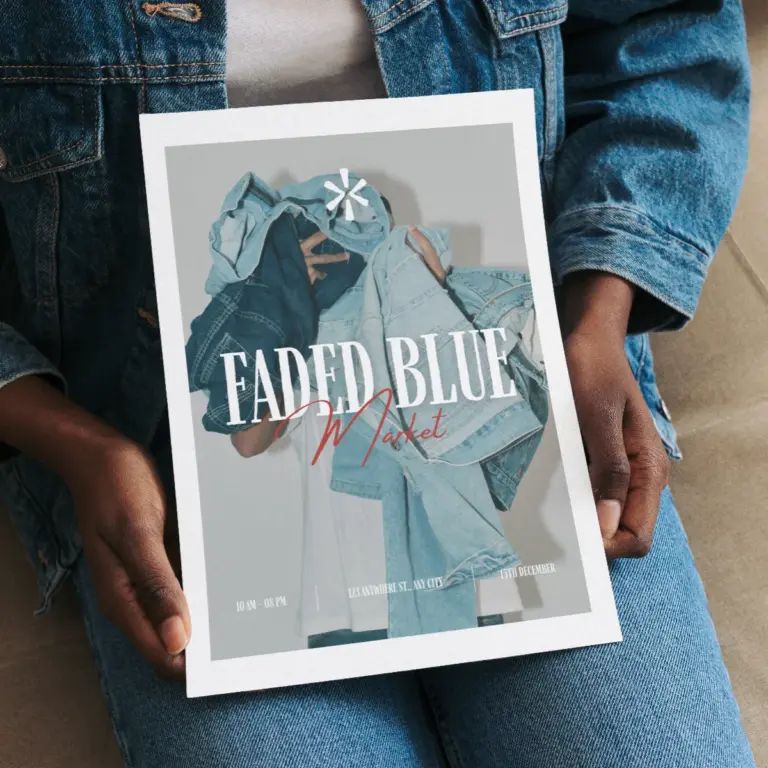 Faded Blue poster held in hand, graphic design by Inversit